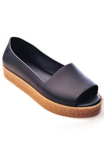 Melissa Puzzle Ad (Black)