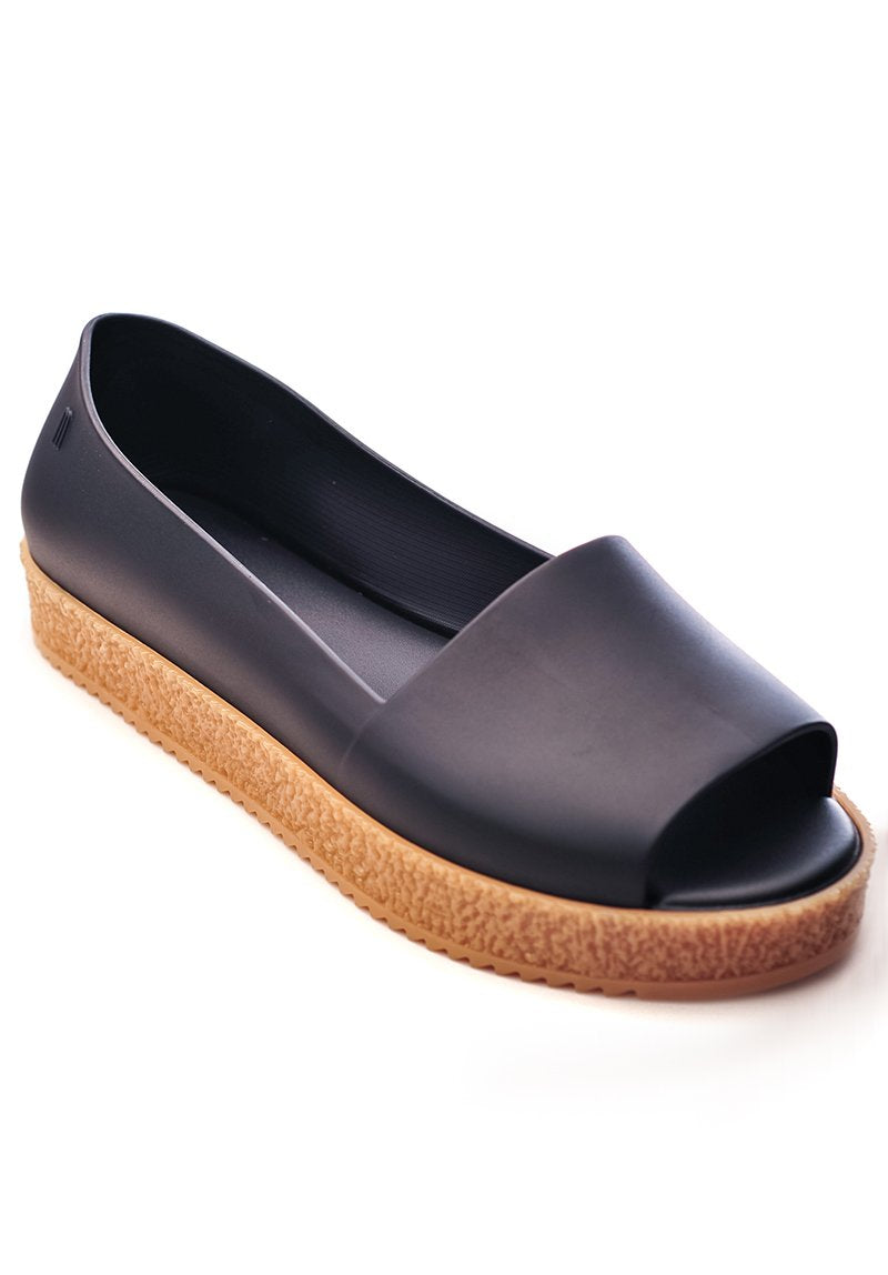 Melissa Puzzle Ad (Black)