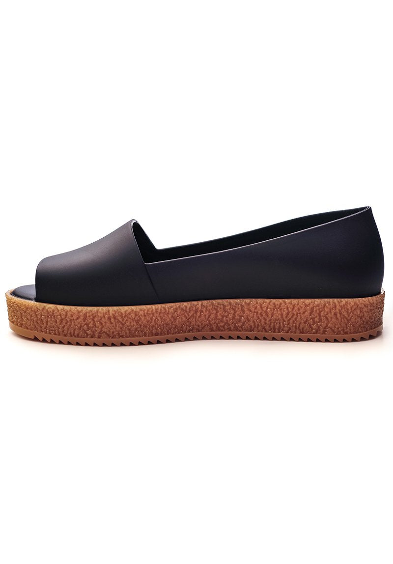 Melissa Puzzle Ad (Black)