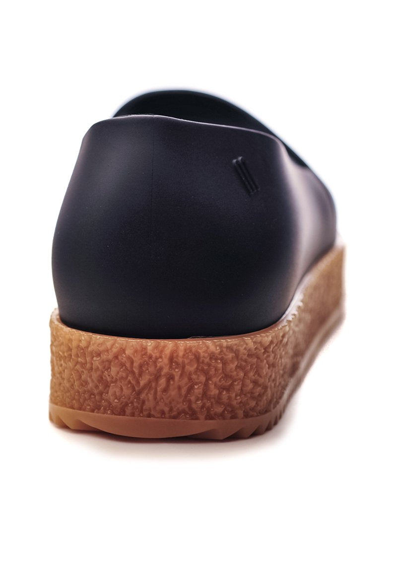 Melissa Puzzle Ad (Black)